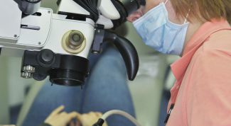 Лечение кисты на зубах с помощью микроскопа и лазера