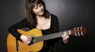 Картинка по теме - как держать гитару