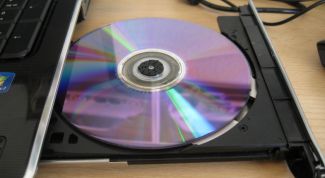 Картинка по теме - как вставлять диск в дисковод