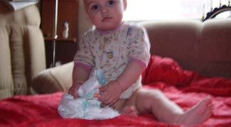 Картинка по теме - как надевать памперс мальчику