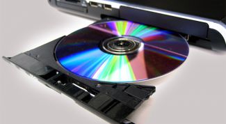 Картинка по теме - как открыть дисковод ноутбука