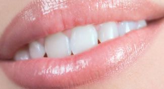 Картинка по теме - как избавиться от черного налета на зубах