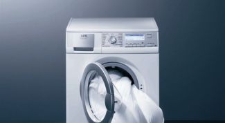 Картинка по теме - как слить воду из стиральной машинки