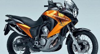 Картинка по теме - как снять колесо на мотоцикле