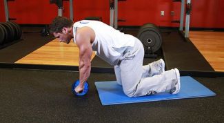 Картинка по теме - как качать пресс с колесиком