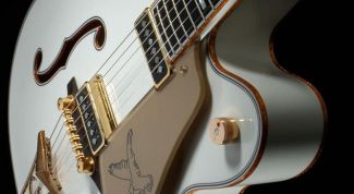 Картинка по теме - как опустить струны на гитаре