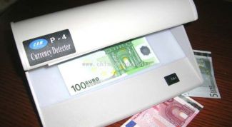 Картинка по теме - как проверить деньги на детекторе