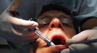 Картинка по теме - что делать, если болит зуб под коронкой