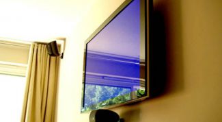 Картинка по теме - как повесить телевизор на кухне