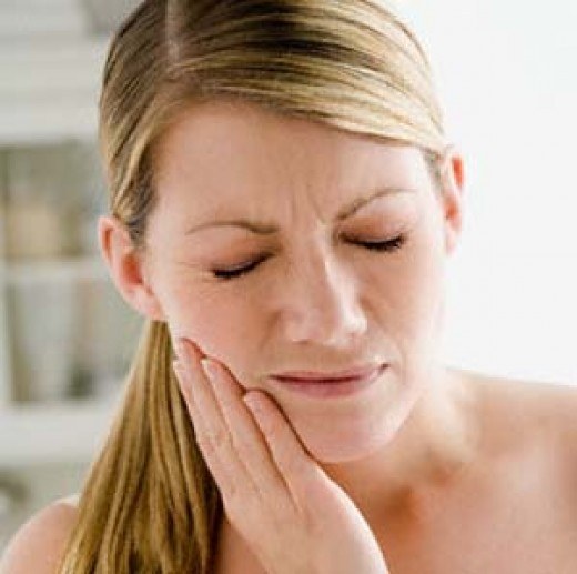 Почему болит зуб после лечения