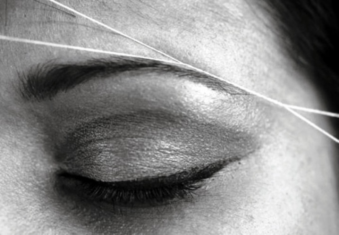 How to pluck eyebrows with thread