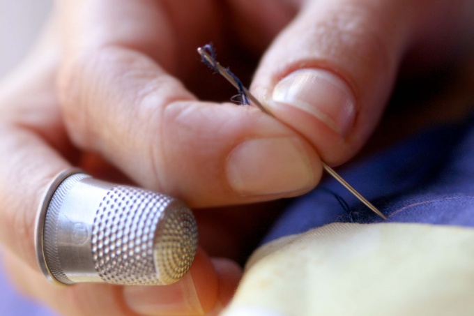 When sewing by hand you may need a thimble