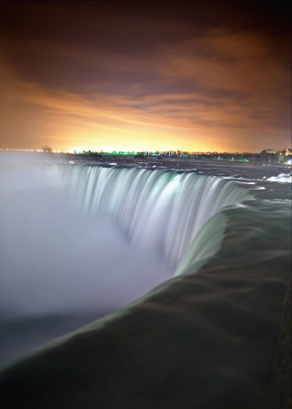 Water at slow shutter speeds (is clearly visible the edge of the cliff, the water like silk).