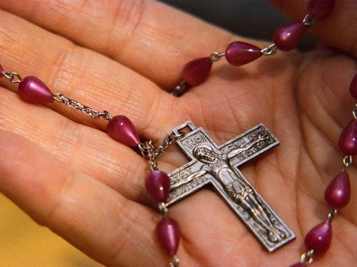 How to wear a pectoral cross