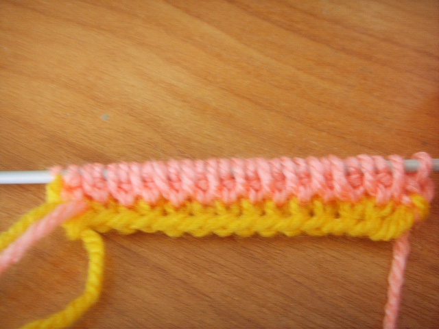 Continued knitting the main thread