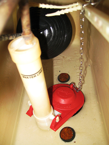 How to fix a toilet tank