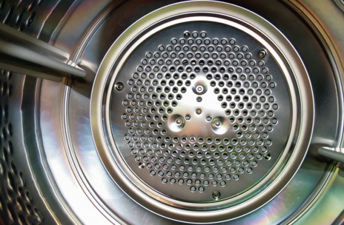 How to open a washing machine drum