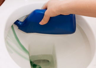 How to clean a toilet - pour a cleaning agent into the toilet