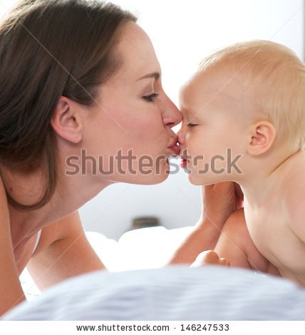 http://image.shutterstock.com/display_pic_with_logo/1138847/146247533/stock-photo-portrait-of-a-beautiful-woman-kissing-baby-146247533.jpg