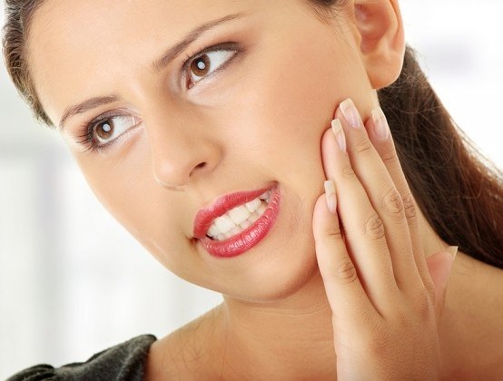 Как уменьшить зубную боль народными средствами
