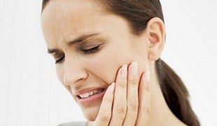 Как временно унять зубную боль