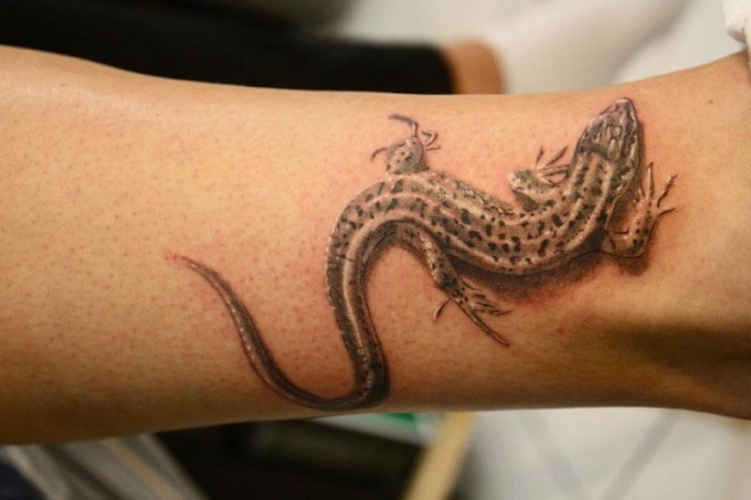 Что означает татуировка в виде ящерицы