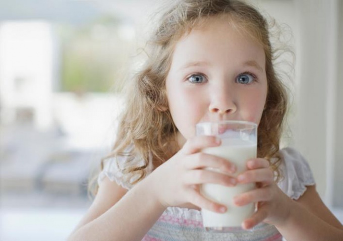 At what age a child can be given fresh cow's milk