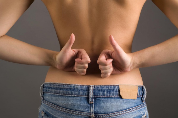 Как устранить боль в спине