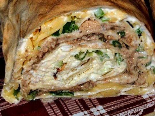 Roll "Soft lavash" with mushrooms, cheese and crab sticks 