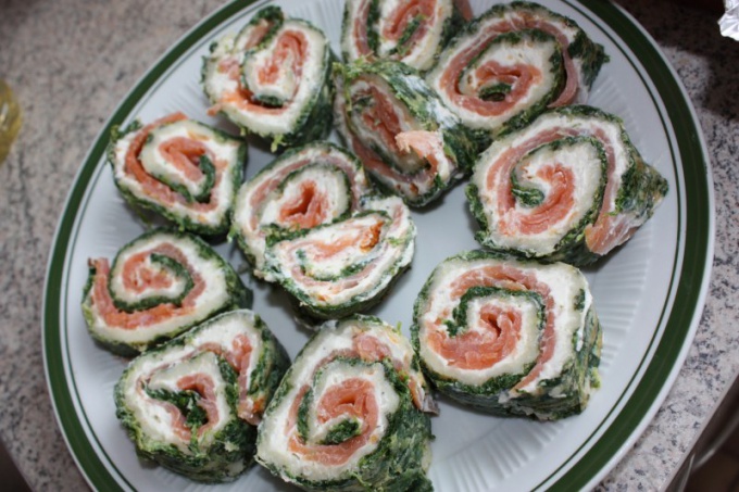 Rolls of pita cream cheese and spinach