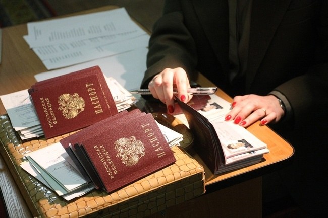 How does the residence permit in the passport