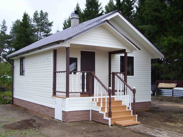 Bath, covered with siding, it looks neat and modern