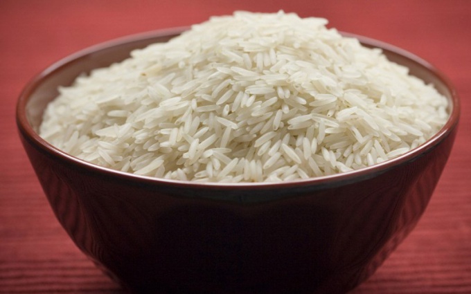 How much water is needed per Cup of rice 