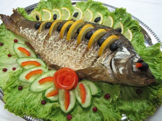 How delicious to cook carp in the oven