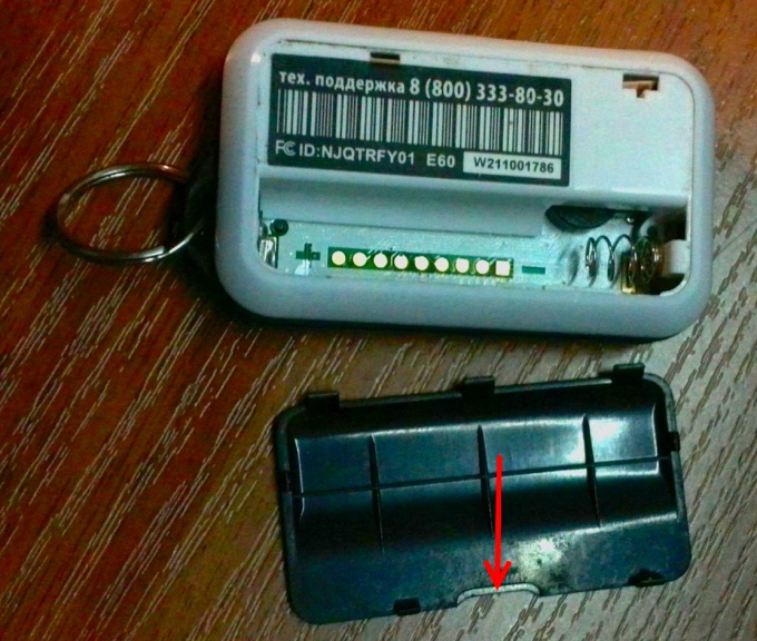 Open the battery compartment keychain StarLine E61