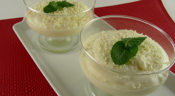 White chocolate mousse in a sauce of kiwi